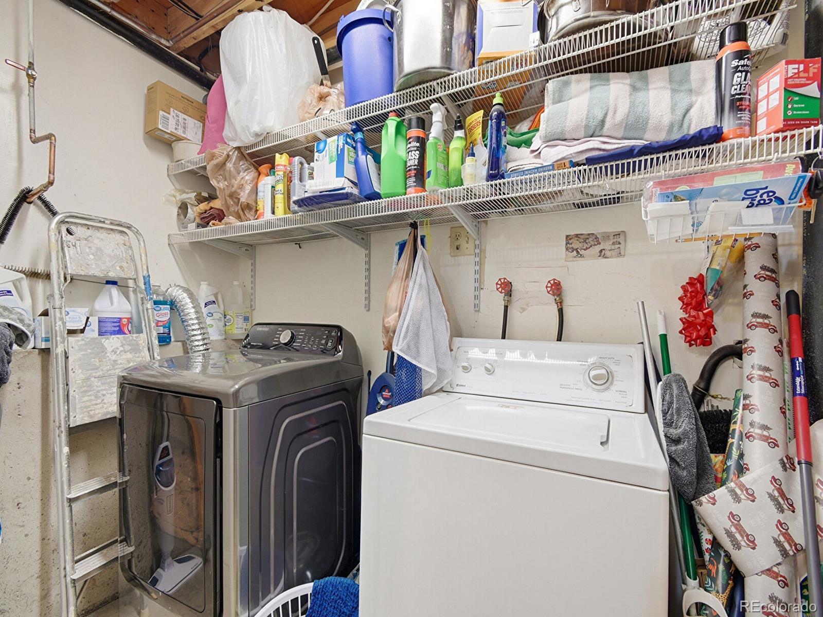 399 Conifer Drive Bailey, CO 80421 - Photo 27 of 42 a utility room with dryer and washer