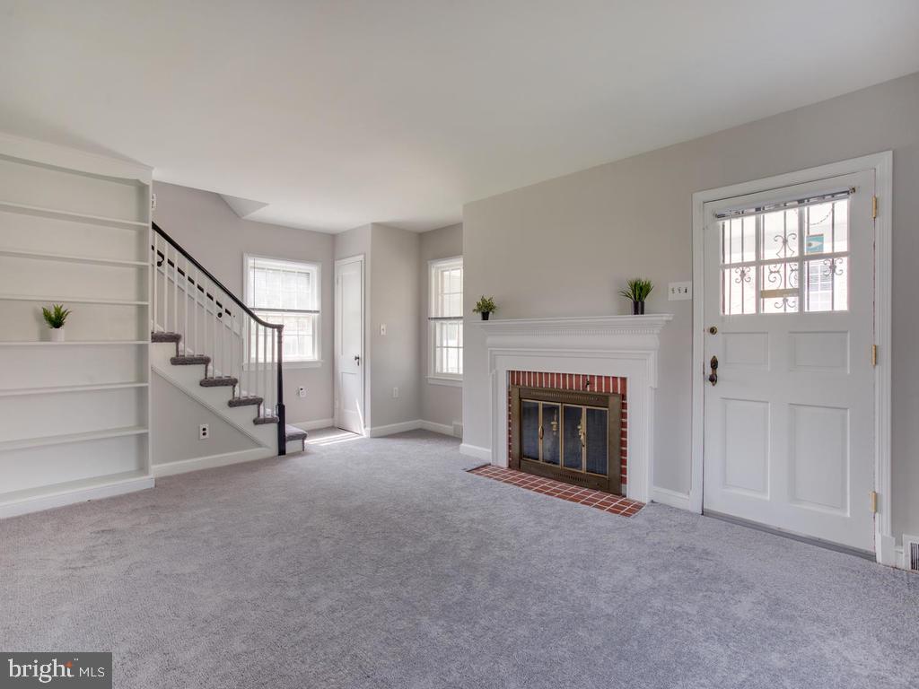 5903 Chillumgate Road Hyattsville, MD 20782 - Photo 8 of 41 Living room with built-in bookcase & fireplace