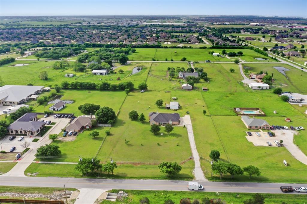 1425 Avondale Haslet Road Fort Worth, TX 76052 - Photo 7 of 10 an aerial view of a golf course with parking