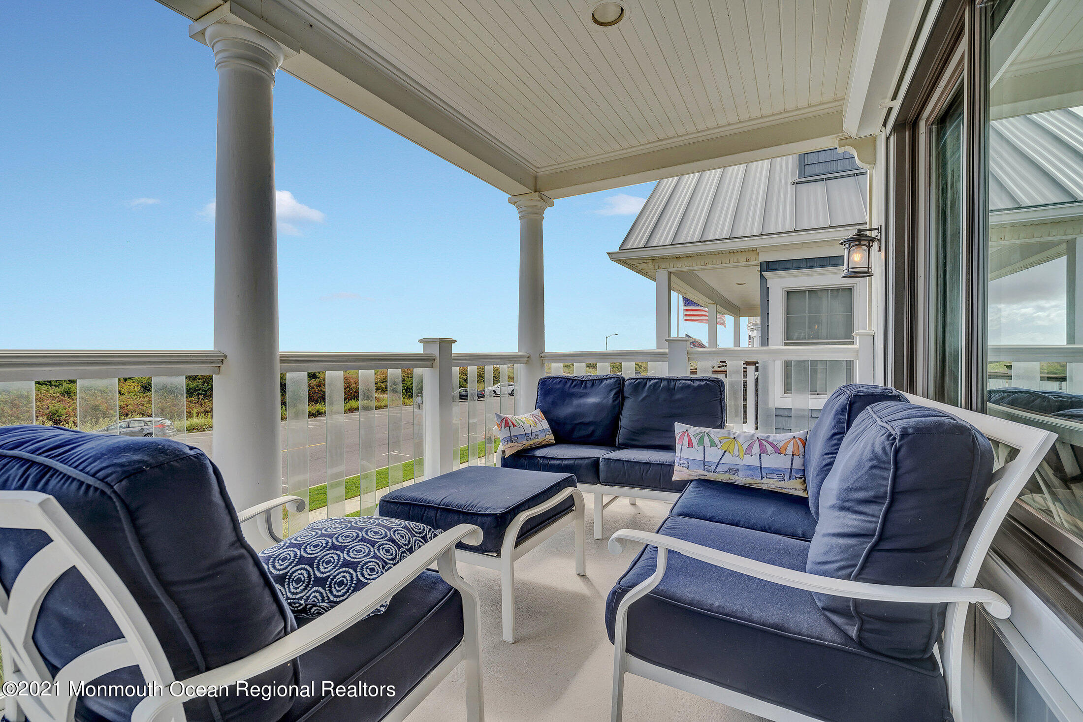 211 North Ocean Avenue Spring Lake, NJ 07762 - Photo 11 of 44 a living room with furniture and a large window