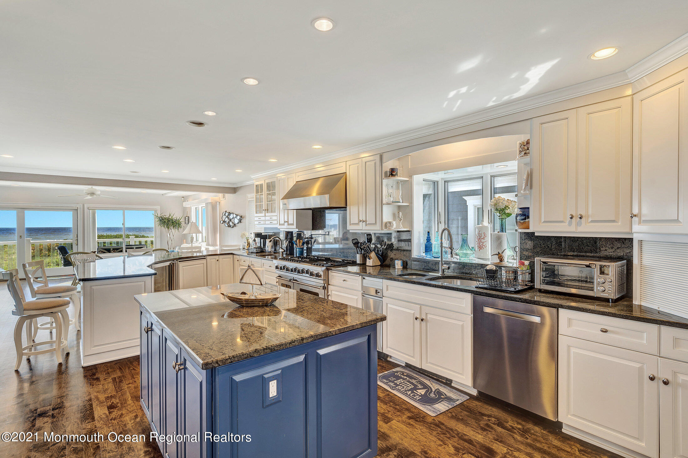 211 North Ocean Avenue Spring Lake, NJ 07762 - Photo 15 of 44 a kitchen with sink stove and cabinets