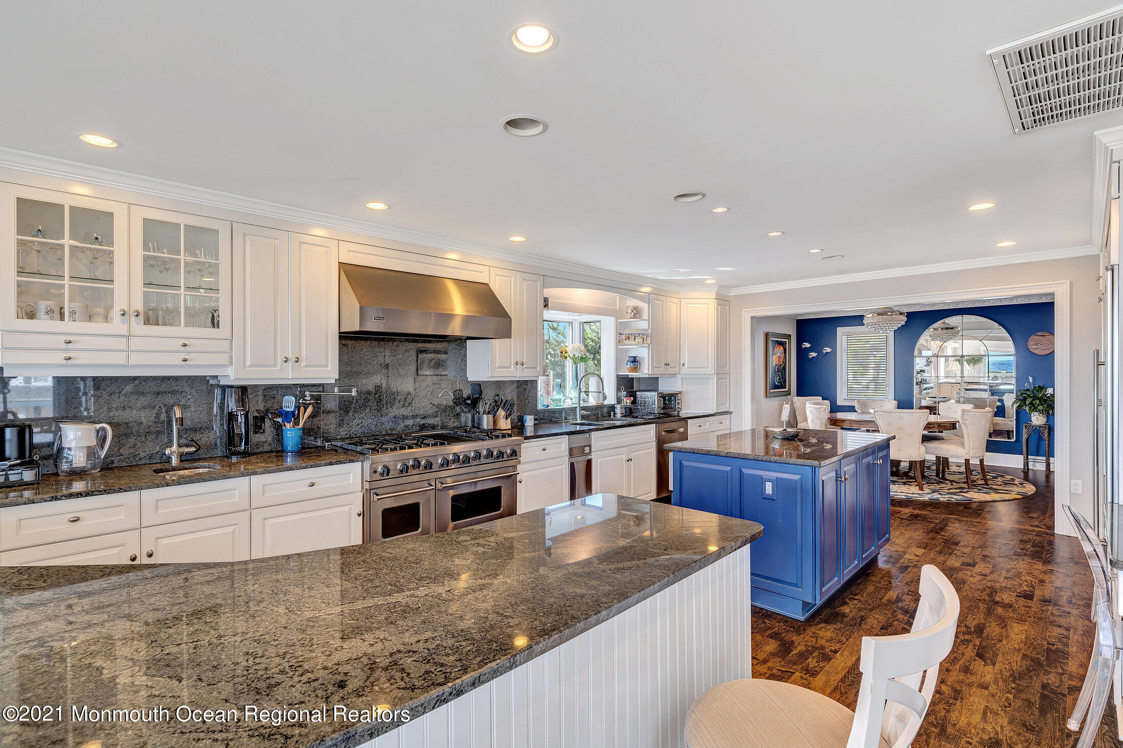 211 North Ocean Avenue Spring Lake, NJ 07762 - Photo 16 of 44 a kitchen with stainless steel appliances granite countertop a stove and a sink