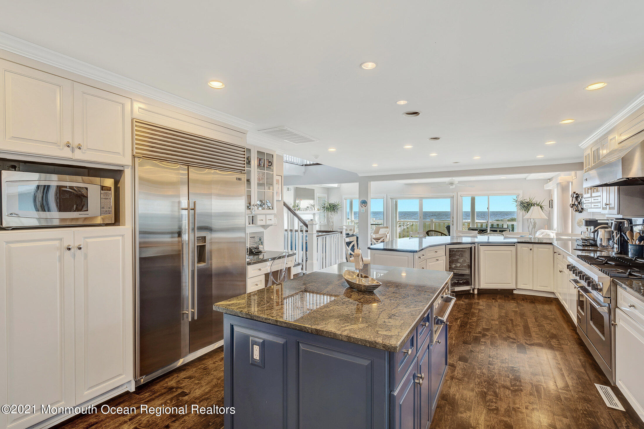 211 North Ocean Avenue Spring Lake, NJ 07762 - Photo 18 of 44 a kitchen with stainless steel appliances granite countertop a sink refrigerator and cabinets