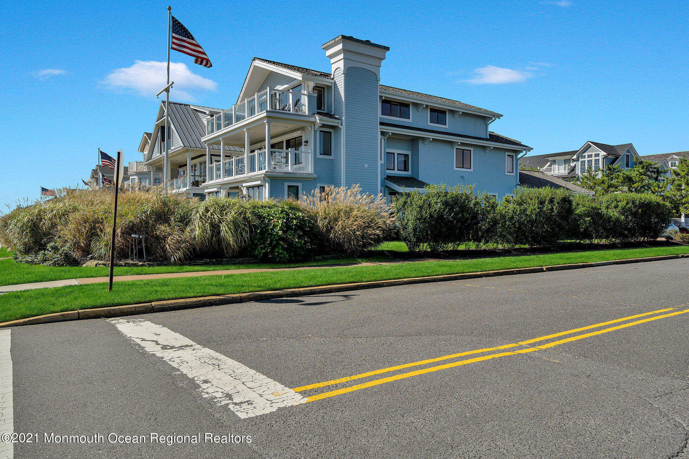 211 North Ocean Avenue Spring Lake, NJ 07762 - Photo 2 of 44 a front view of house with yard and green space