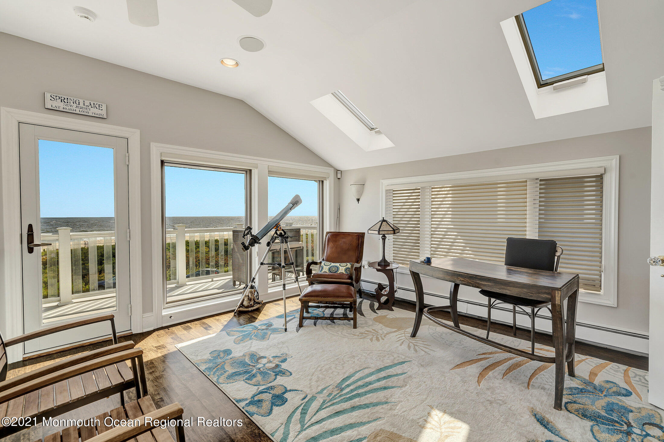 211 North Ocean Avenue Spring Lake, NJ 07762 - Photo 30 of 44 a living room with furniture a rug and a window