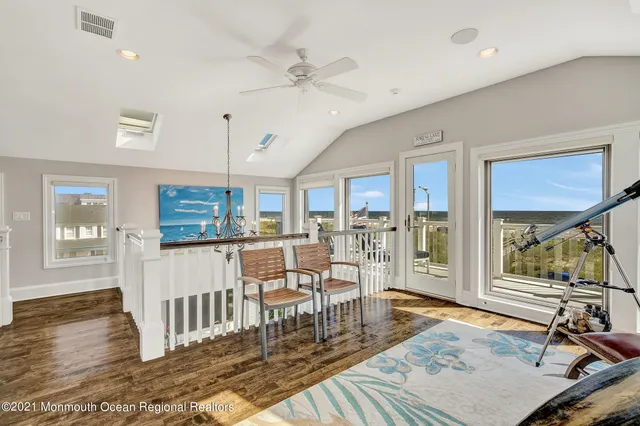 a view of a living room and dining room