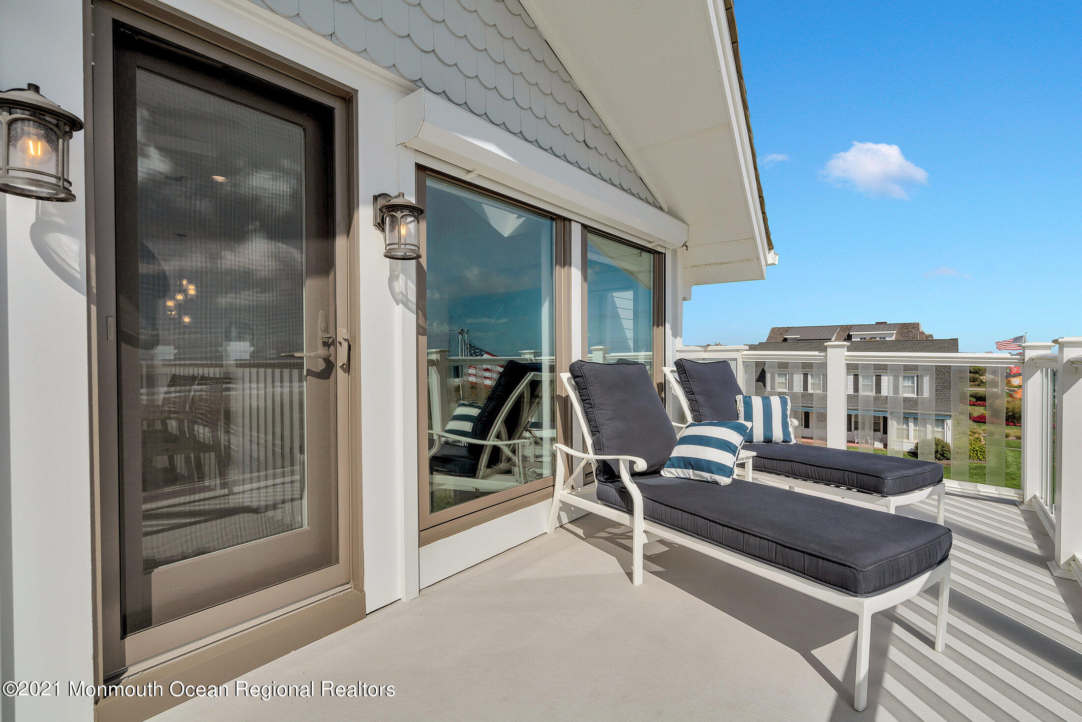 211 North Ocean Avenue Spring Lake, NJ 07762 - Photo 36 of 44 a view of a balcony with chairs