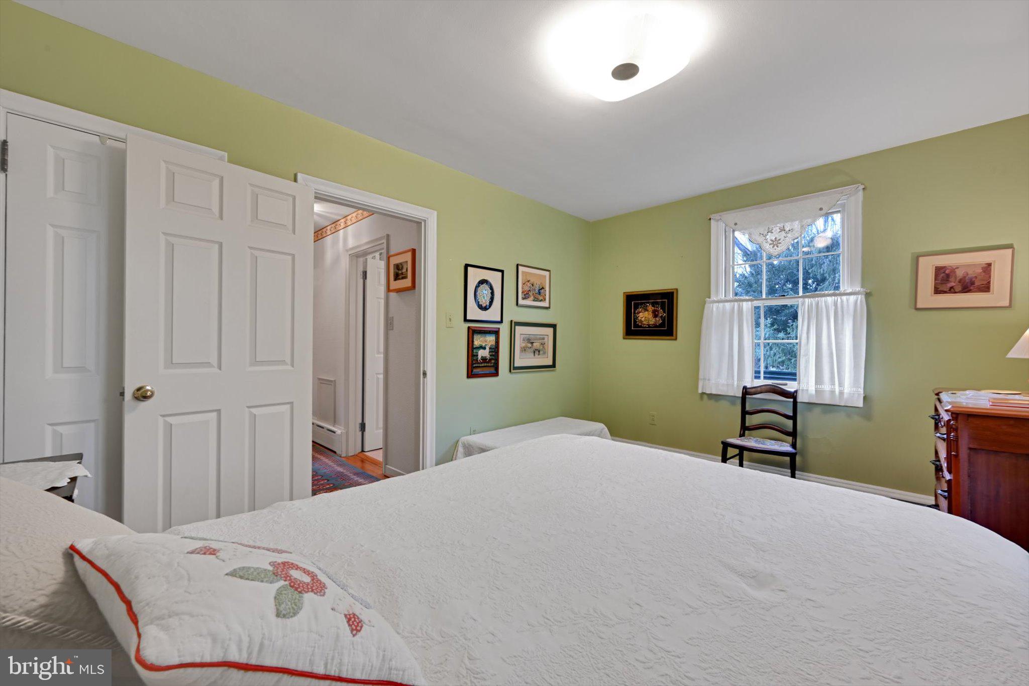 411 Woodcrest Avenue Lititz, PA 17543 - Photo 15 of 38 a bedroom with a bed and a window