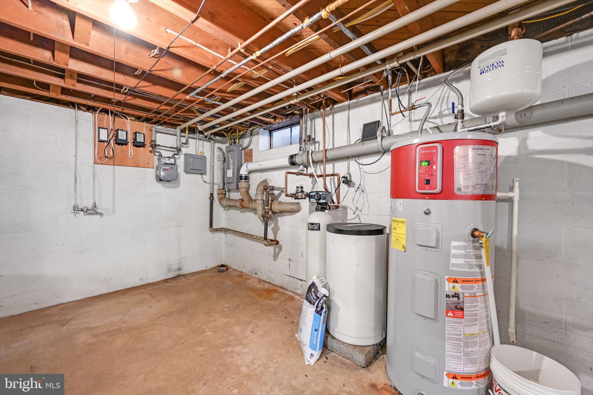 411 Woodcrest Avenue Lititz, PA 17543 - Photo 29 of 38 a utility room with fridge and lot of wooden furniture