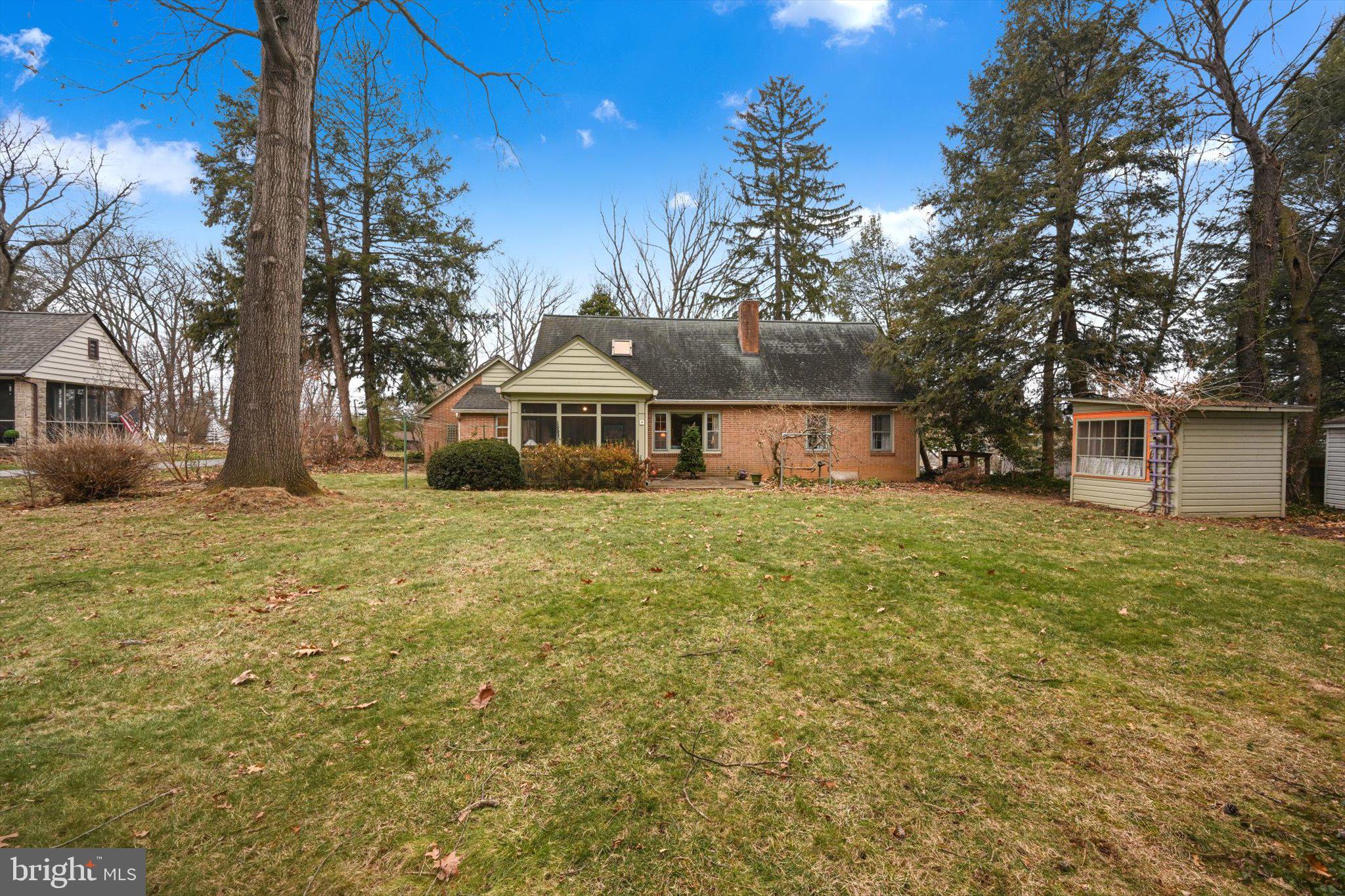 411 Woodcrest Avenue Lititz, PA 17543 - Photo 31 of 38 a front view of a house with a yard