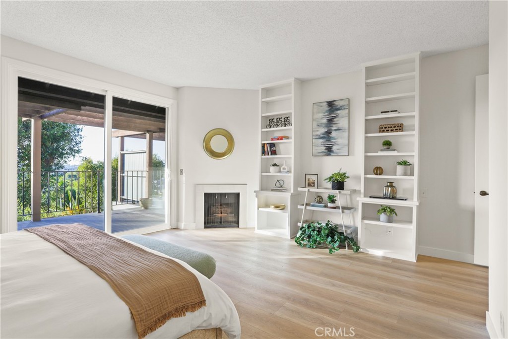 637 Avery Place Long Beach, CA 90807 - Photo 11 of 19 a spacious bedroom with a bed and a window