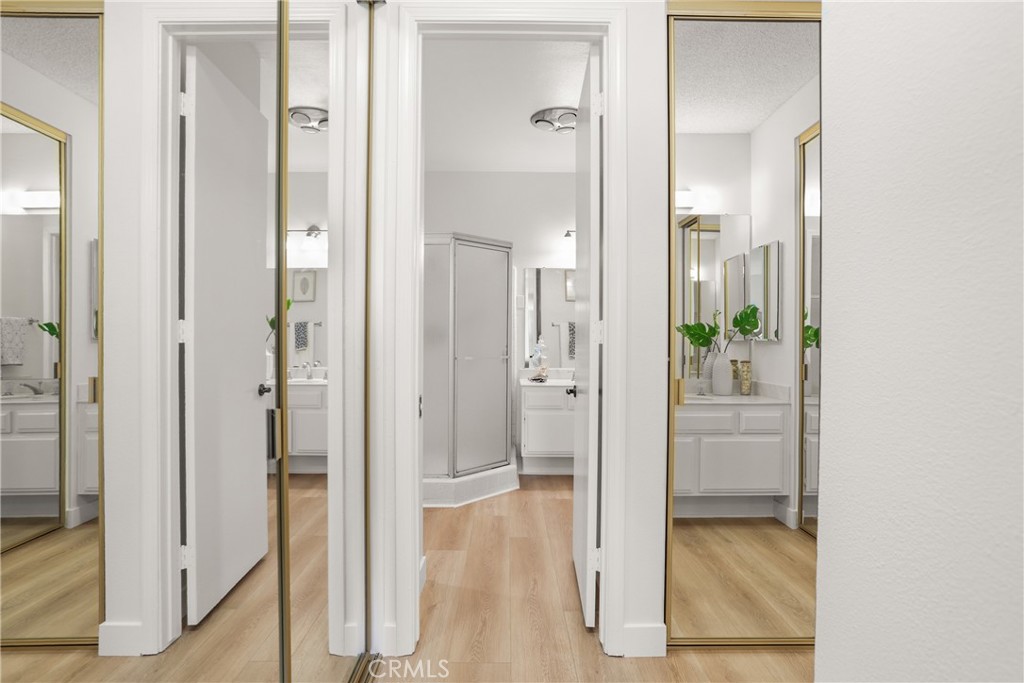 637 Avery Place Long Beach, CA 90807 - Photo 12 of 19 a bathroom with a glass shower door and a glass door