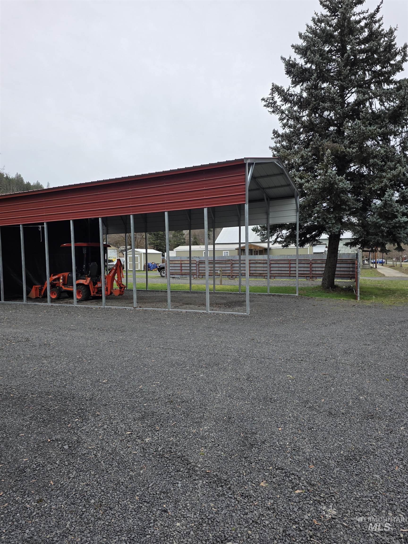 220 South Main Street Peck, ID 83545 - Photo 5 of 15 View of parking featuring a detached carport
