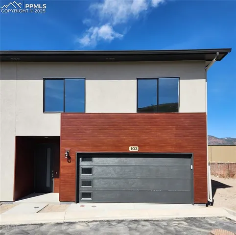 a view of a house with a garage