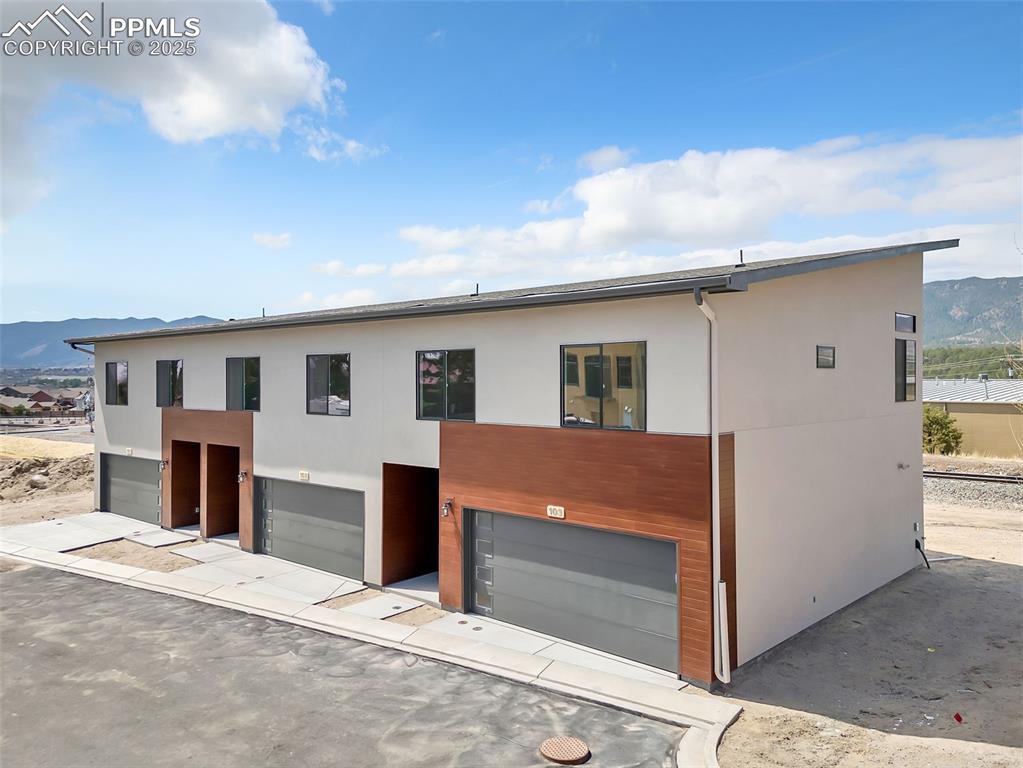 241 Front Street, Unit 103 Monument, CO 80132 - Photo 22 of 28 a view of kitchen with refrigerator and window