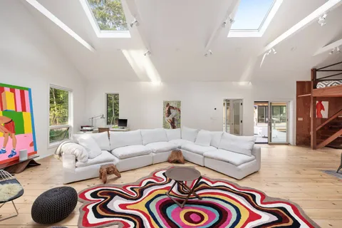 a living room with furniture and a couch