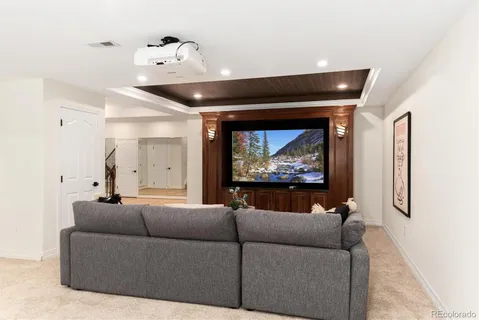 a kitchen with stainless steel appliances granite countertop a refrigerator a stove a sink and a refrigerator