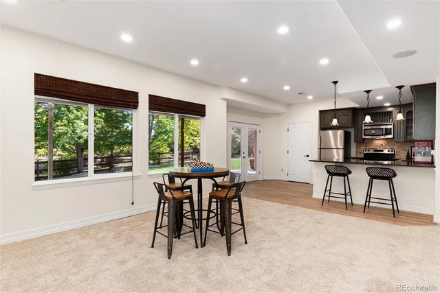 a bathroom with a sink toilet and mirror