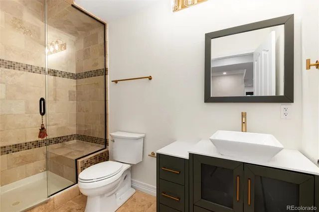 a view of outdoor sitting area with a table and chairs