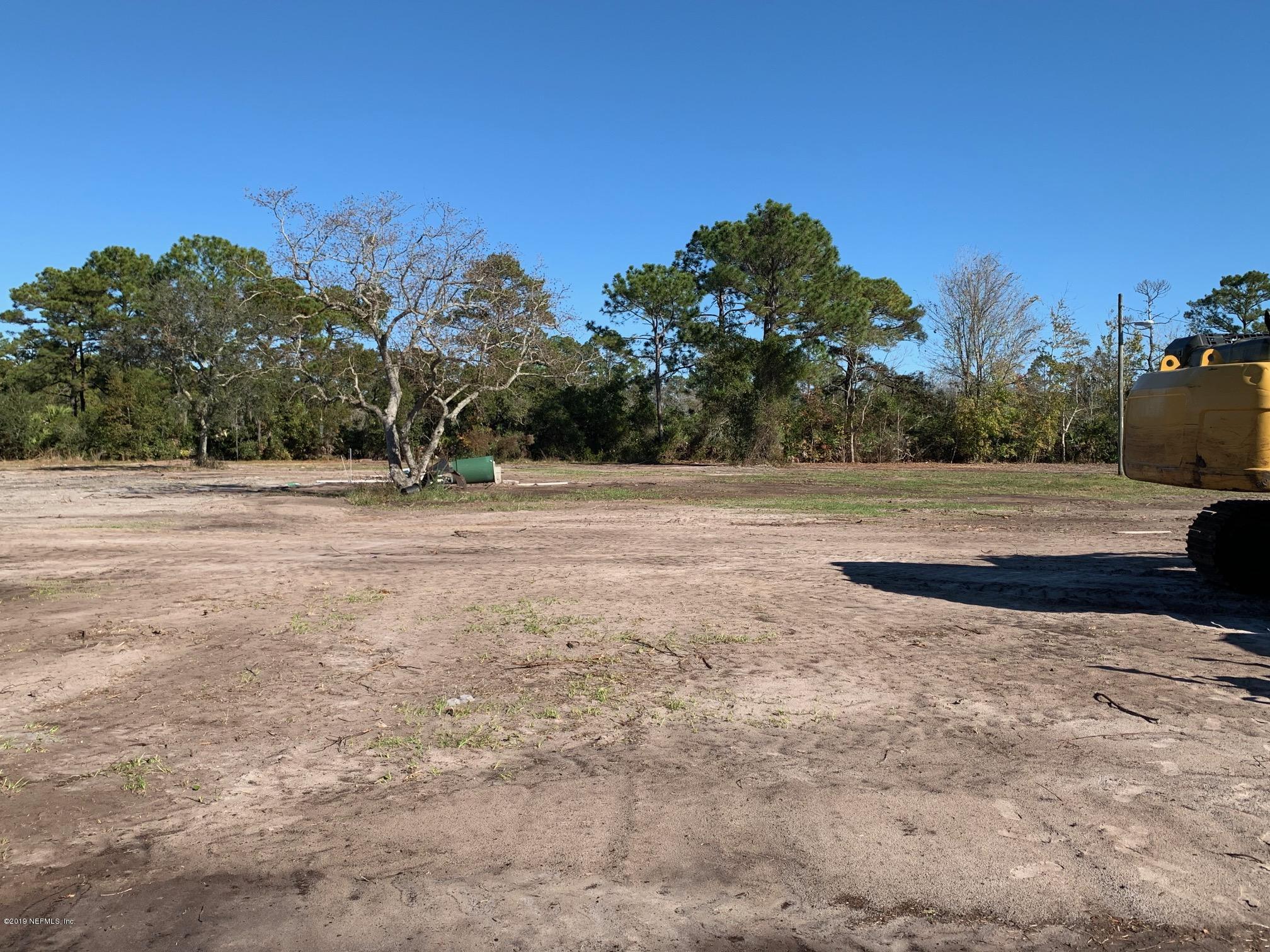 10451 Sawpit Road Jacksonville, FL 32226 - Photo 1 of 37 a view of dirt field with trees in background