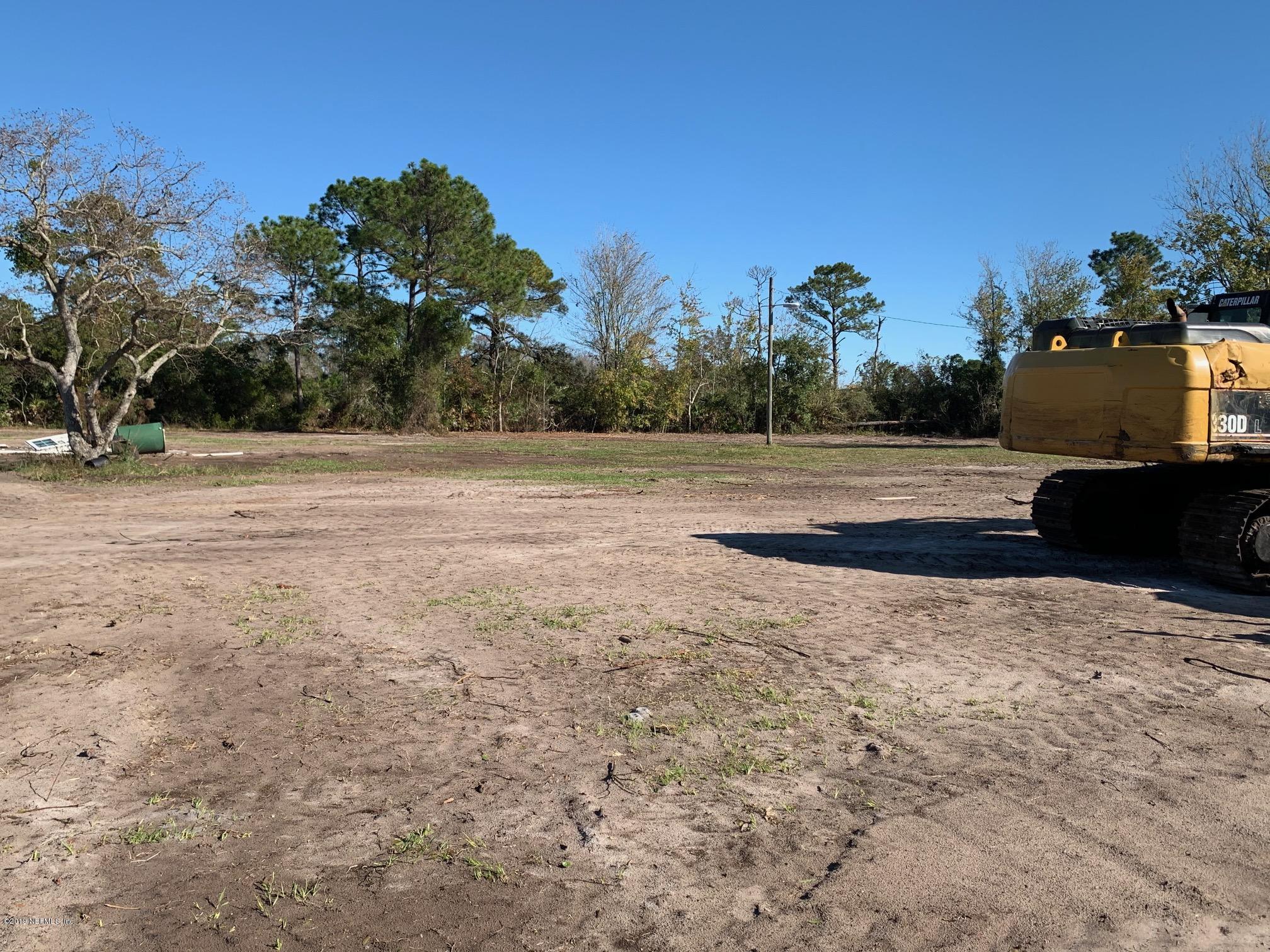 10451 Sawpit Road Jacksonville, FL 32226 - Photo 11 of 37 a view of dirt yard with large trees