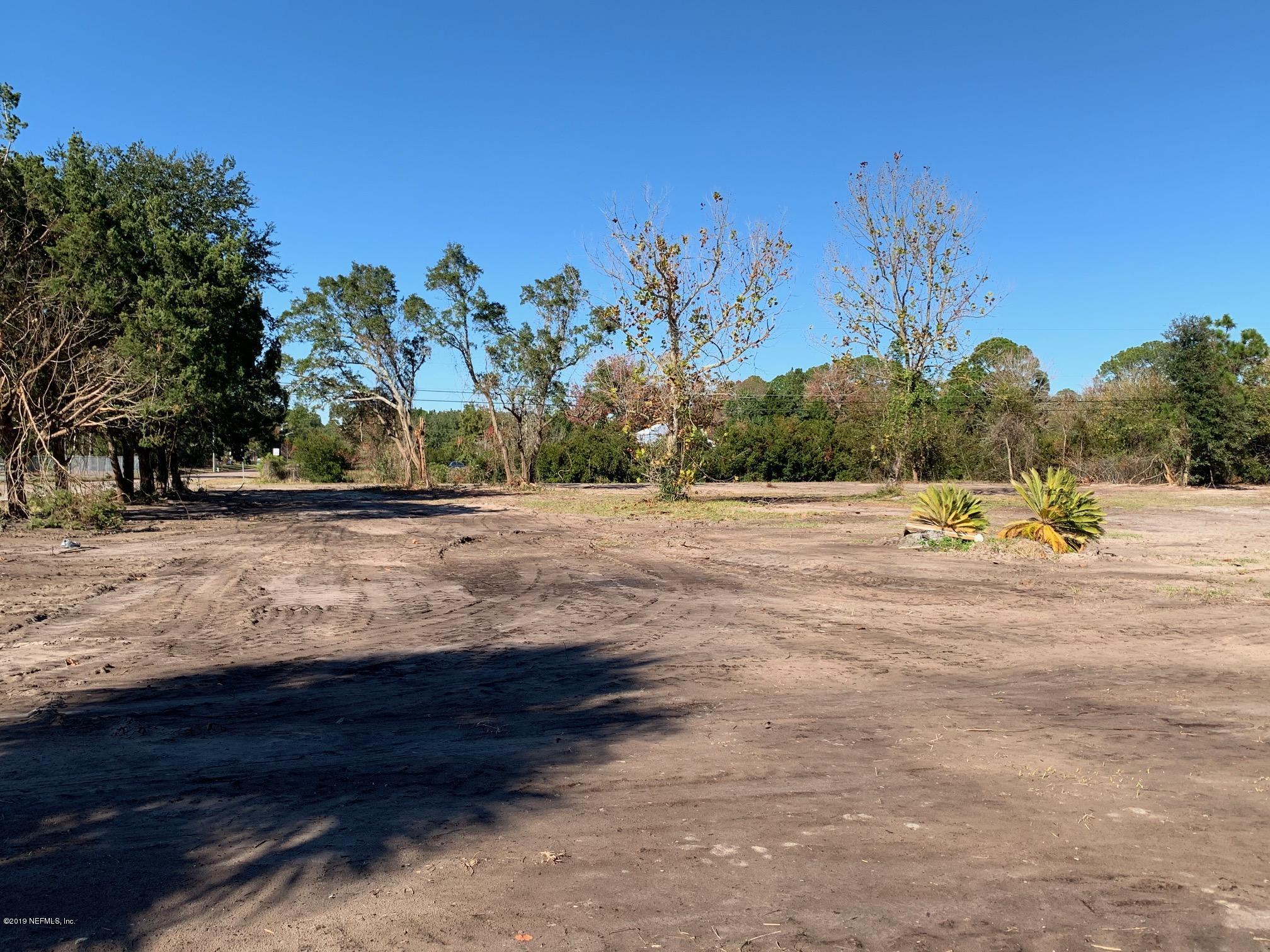10451 Sawpit Road Jacksonville, FL 32226 - Photo 12 of 37 a view of a yard with a tree
