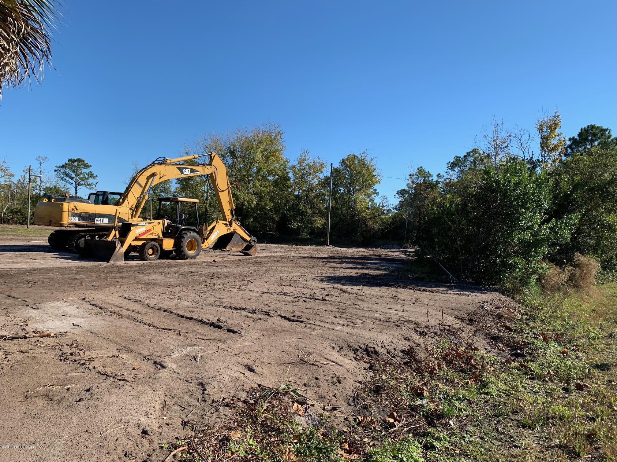 10451 Sawpit Road Jacksonville, FL 32226 - Photo 20 of 37 a view of outdoor space with lots of trees in the background