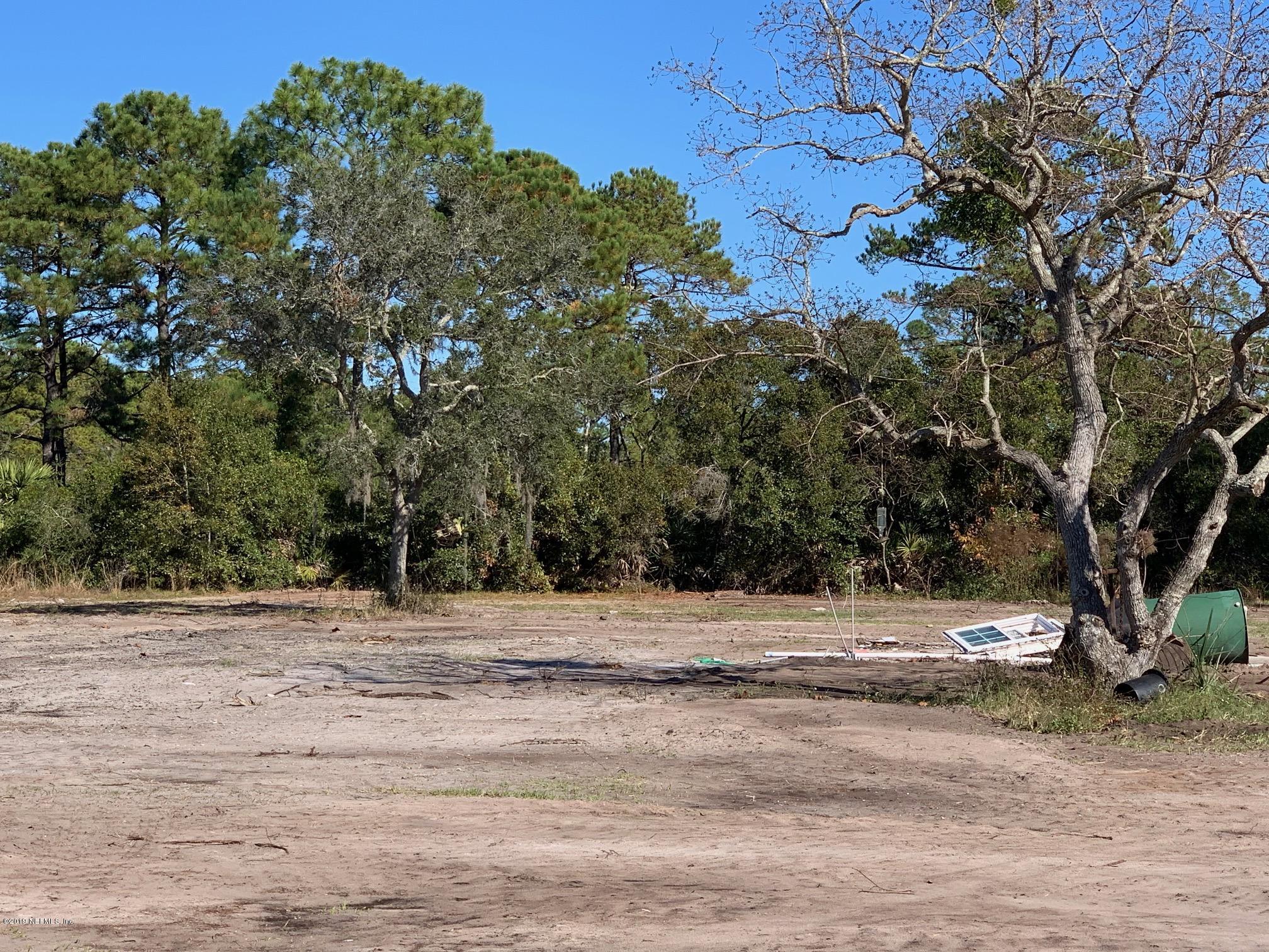 10451 Sawpit Road Jacksonville, FL 32226 - Photo 2 of 37 a view of a house with a yard
