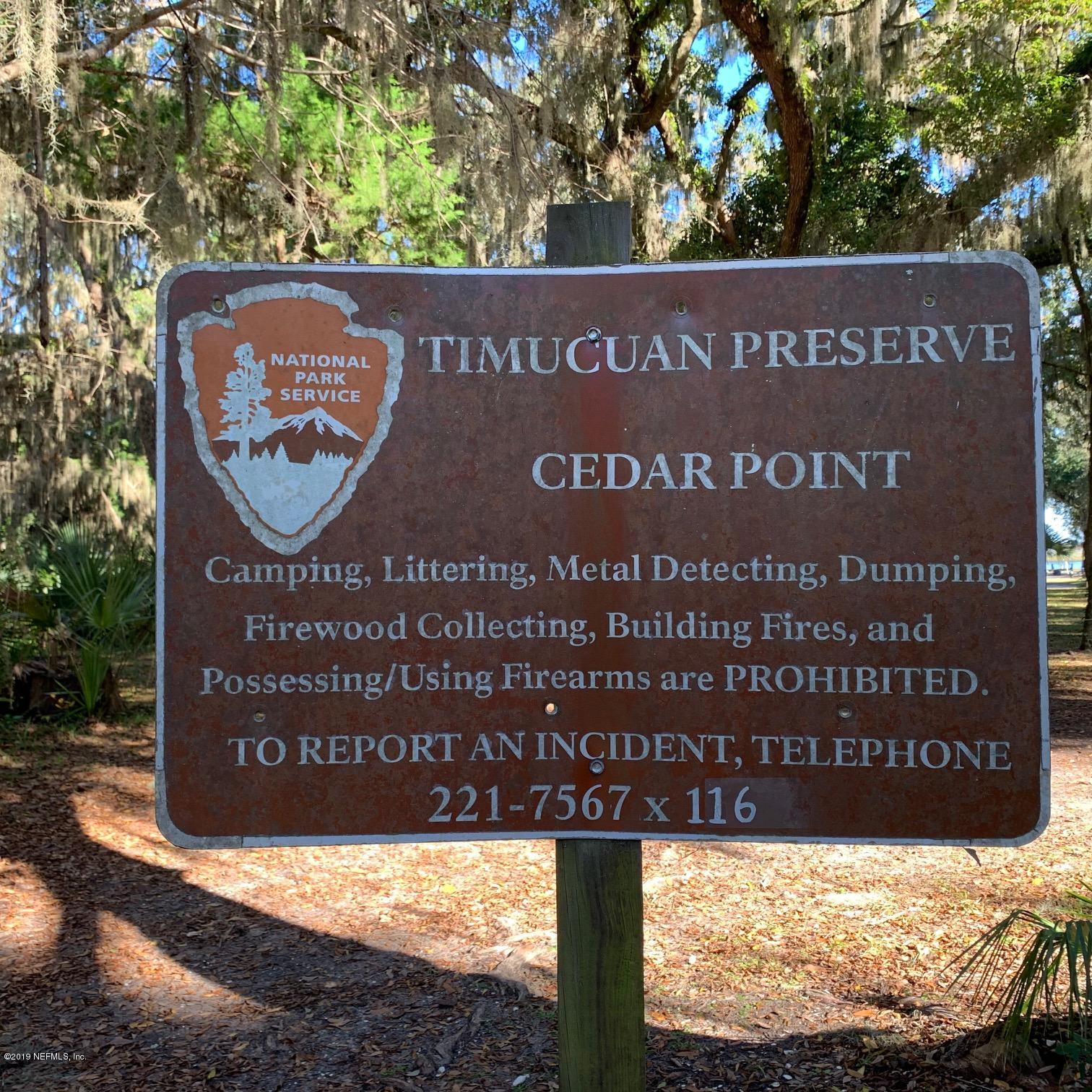 10451 Sawpit Road Jacksonville, FL 32226 - Photo 31 of 37 a sign on the side of the building