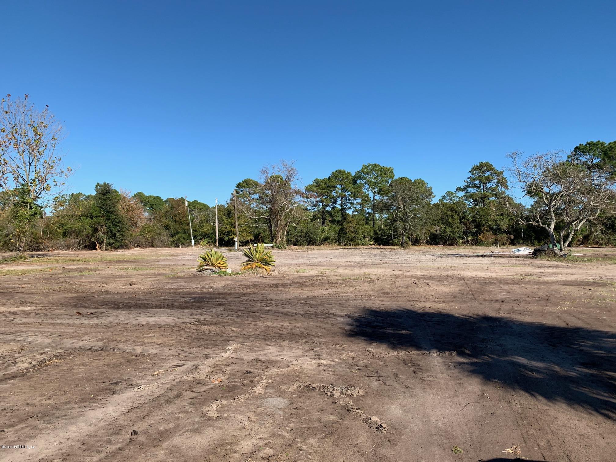 10451 Sawpit Road Jacksonville, FL 32226 - Photo 4 of 37 a view of yard with large trees and cars parked on road