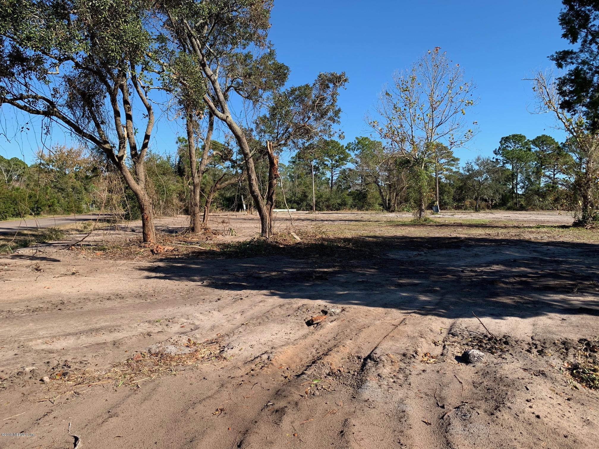 10451 Sawpit Road Jacksonville, FL 32226 - Photo 9 of 37 a view of yard with tree in the background