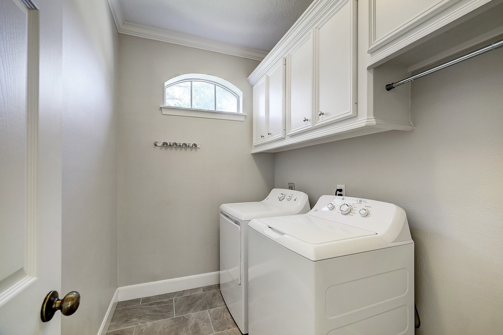 18902 Mountain Spring Drive Spring, TX 77379 - Photo 16 of 32 a utility room with dryer and washer