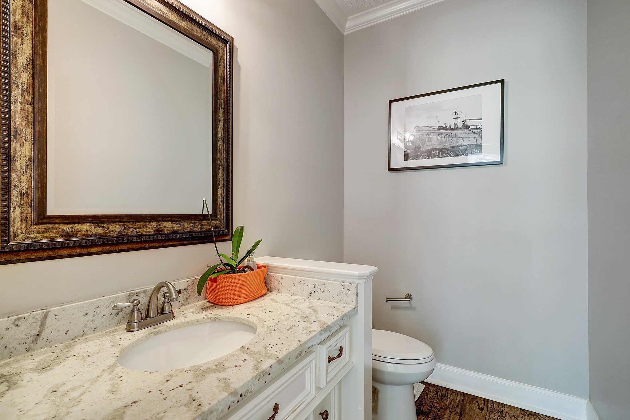18902 Mountain Spring Drive Spring, TX 77379 - Photo 17 of 32 a bathroom with a granite countertop toilet sink and mirror