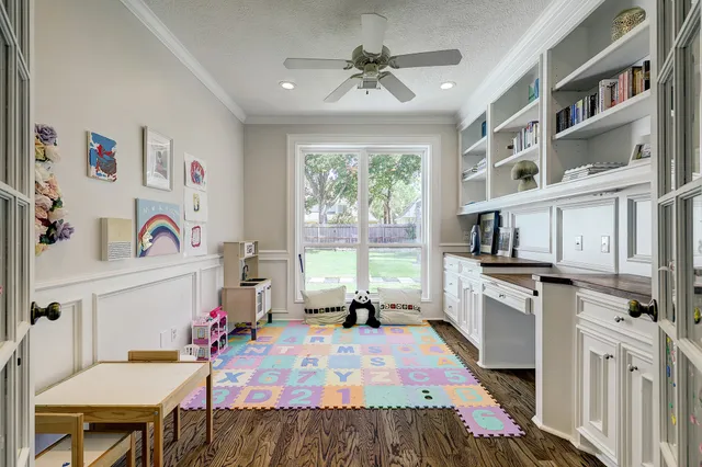 a kitchen with cabinets appliances and a counter space