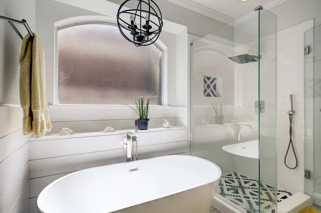 a living room with furniture a rug and a flat screen tv