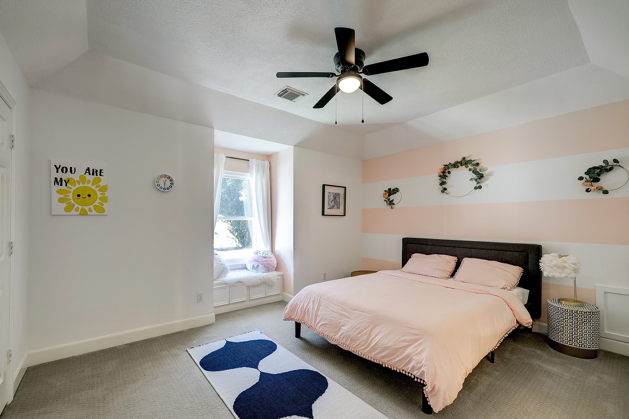 18902 Mountain Spring Drive Spring, TX 77379 - Photo 27 of 32 a bedroom with a bed and a window