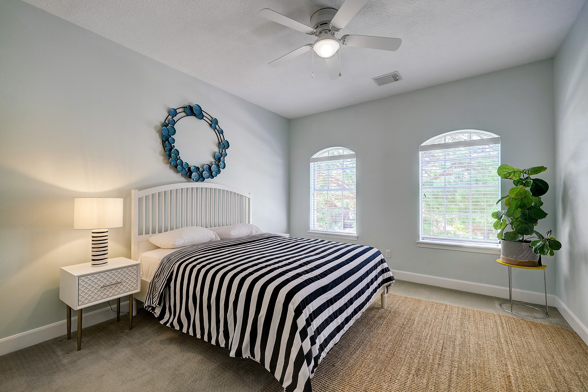 18902 Mountain Spring Drive Spring, TX 77379 - Photo 28 of 32 a bedroom with a bed and a window