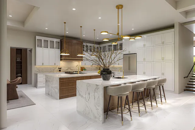 a kitchen with stainless steel appliances kitchen island granite countertop a stove a sink a oven a dining table and chairs