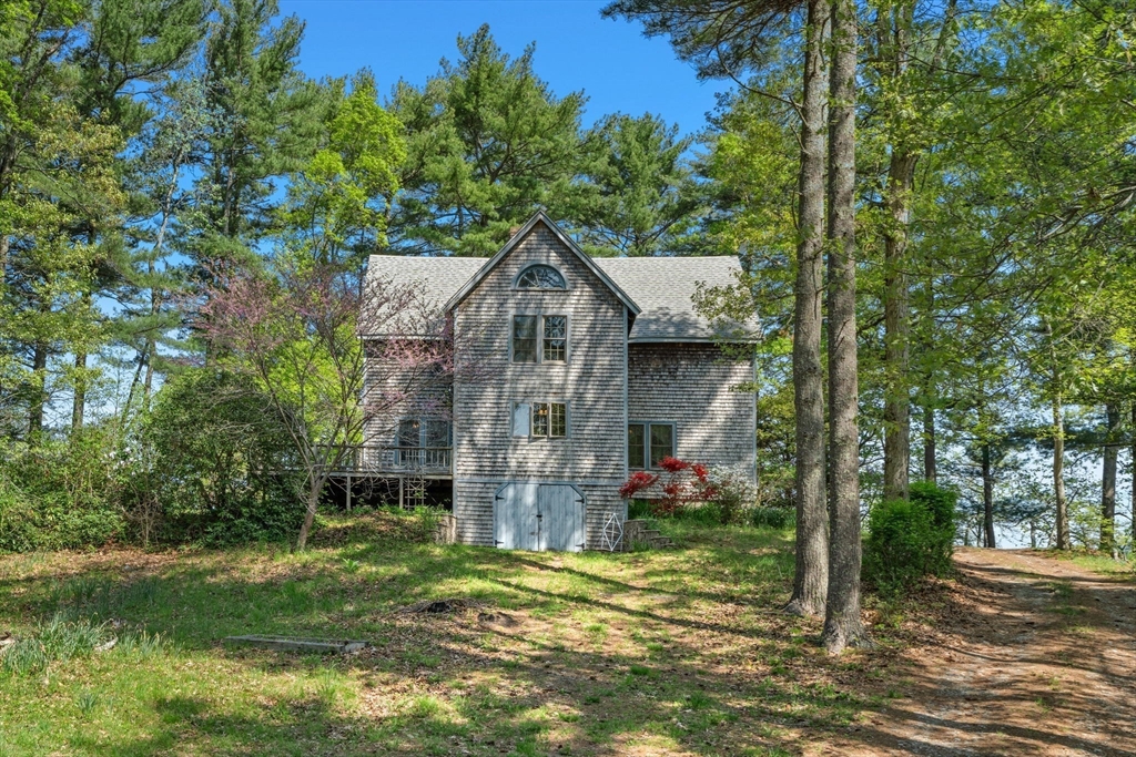 362 Snows Pond Road Rochester, MA 02770 - Photo 37 of 41 a view of a house with garden and trees
