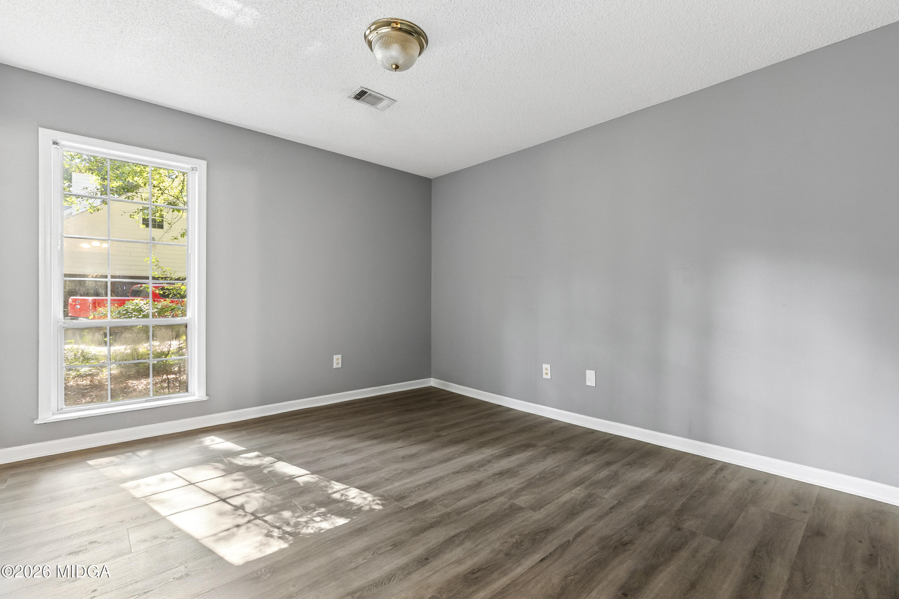 5626 Janeru Circle Macon, GA 31216 - Photo 23 of 45 a view of an empty room with a window