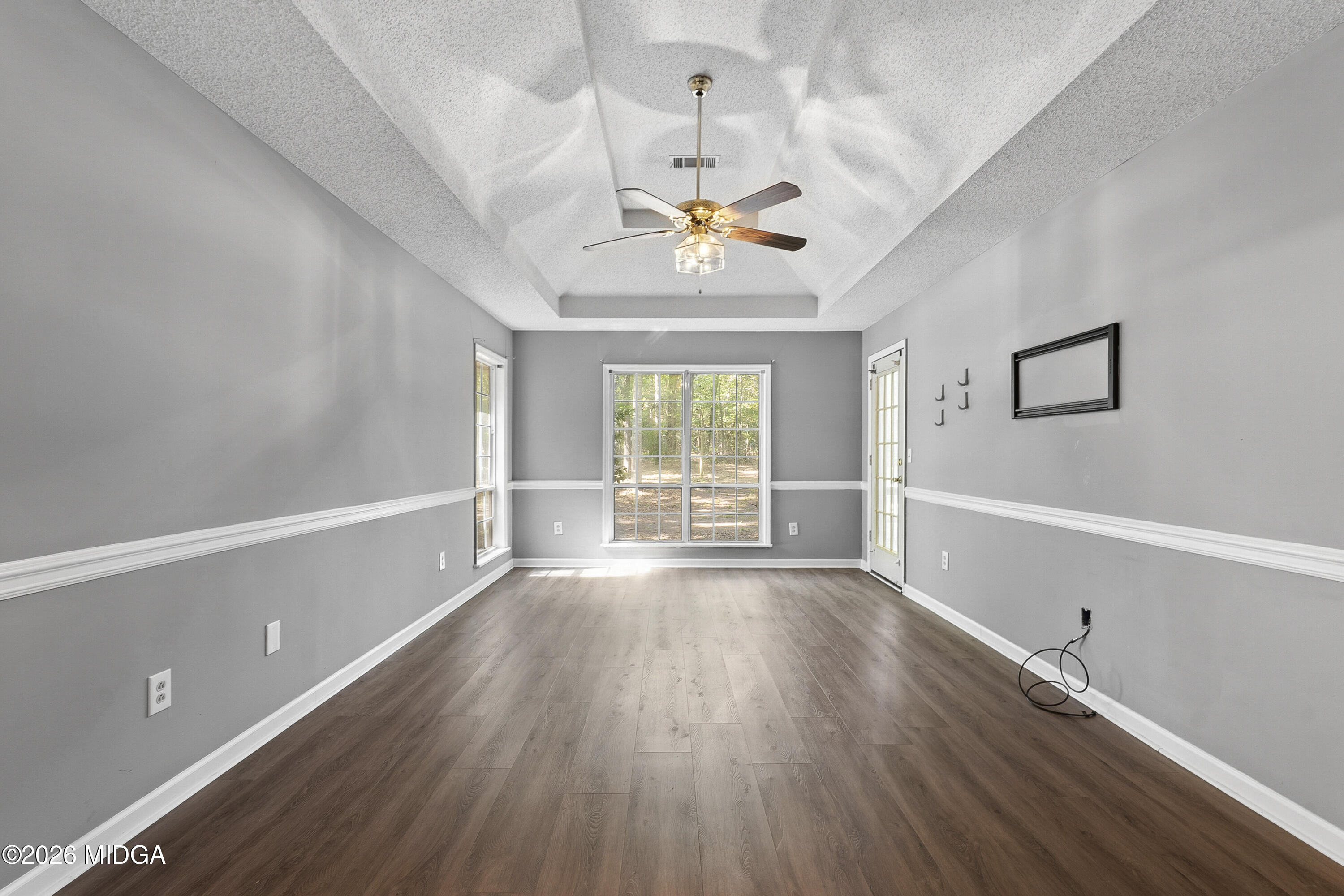 5626 Janeru Circle Macon, GA 31216 - Photo 32 of 45 wooden floor in an empty room with a window