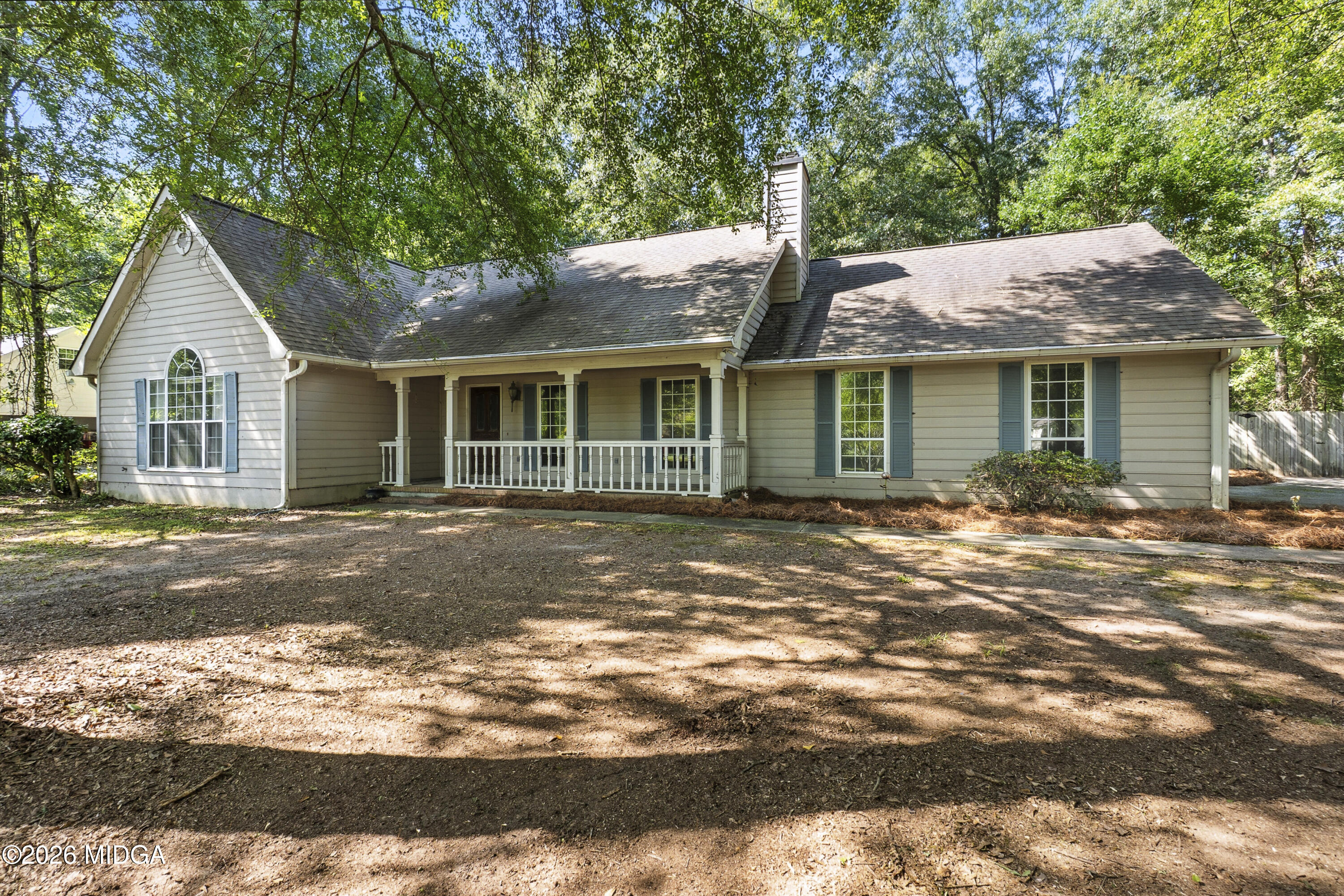 5626 Janeru Circle Macon, GA 31216 - Photo 34 of 45 a front view of a house with a garden