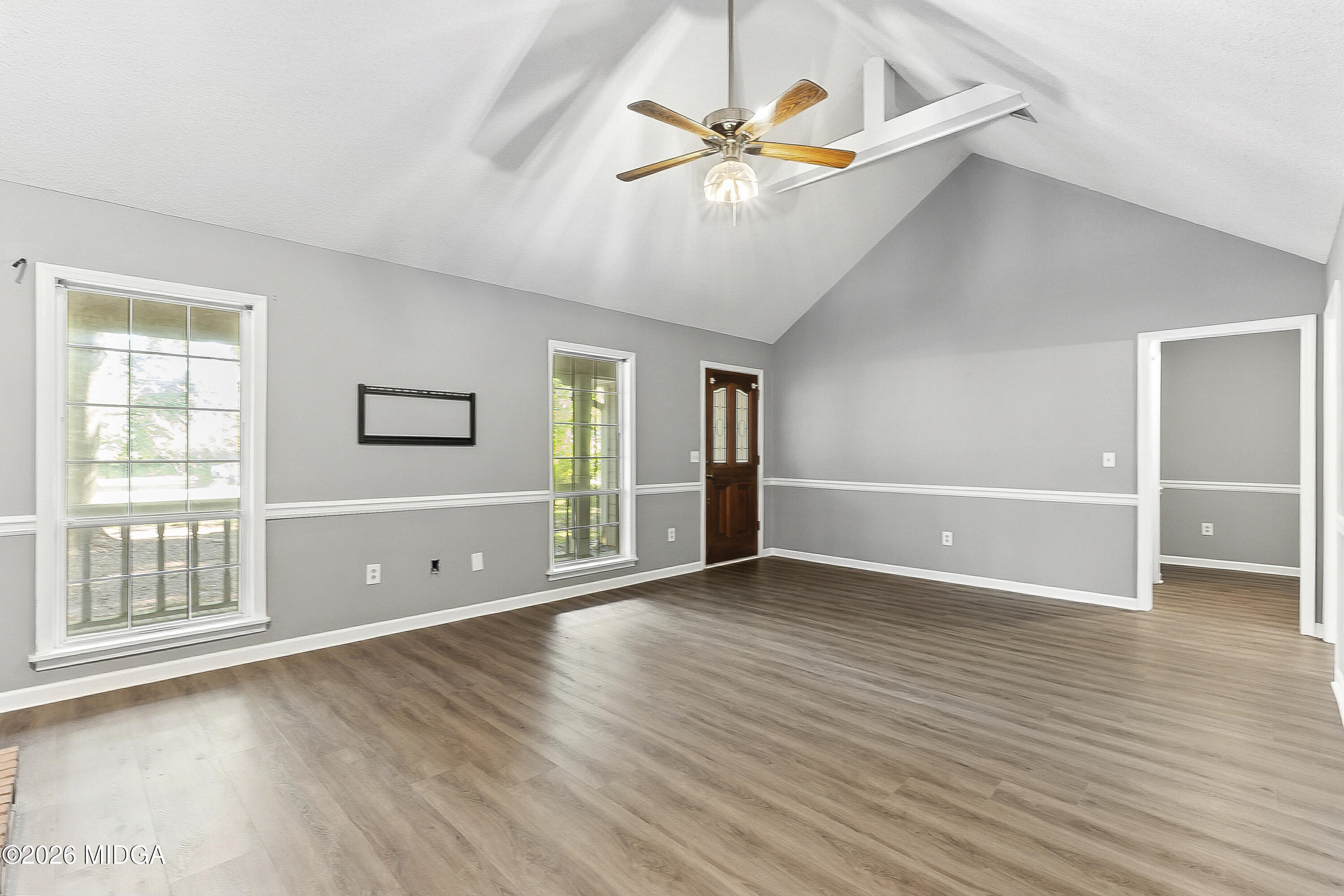 5626 Janeru Circle Macon, GA 31216 - Photo 4 of 45 wooden floor in an empty room with a window