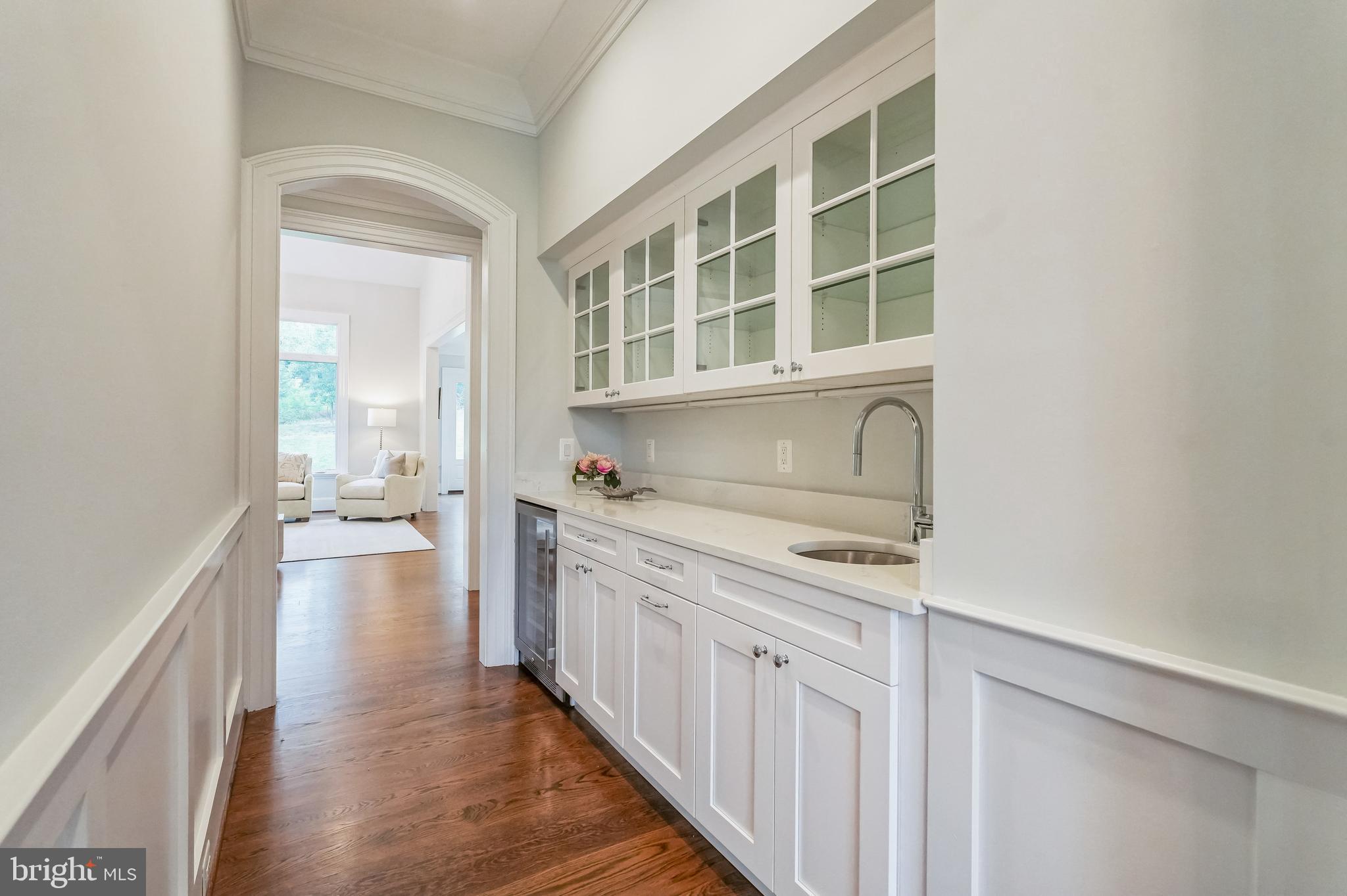 305 Old Courthouse Road Northeast Vienna, VA 22180 - Photo 15 of 69 a kitchen with a cabinets and wooden floor