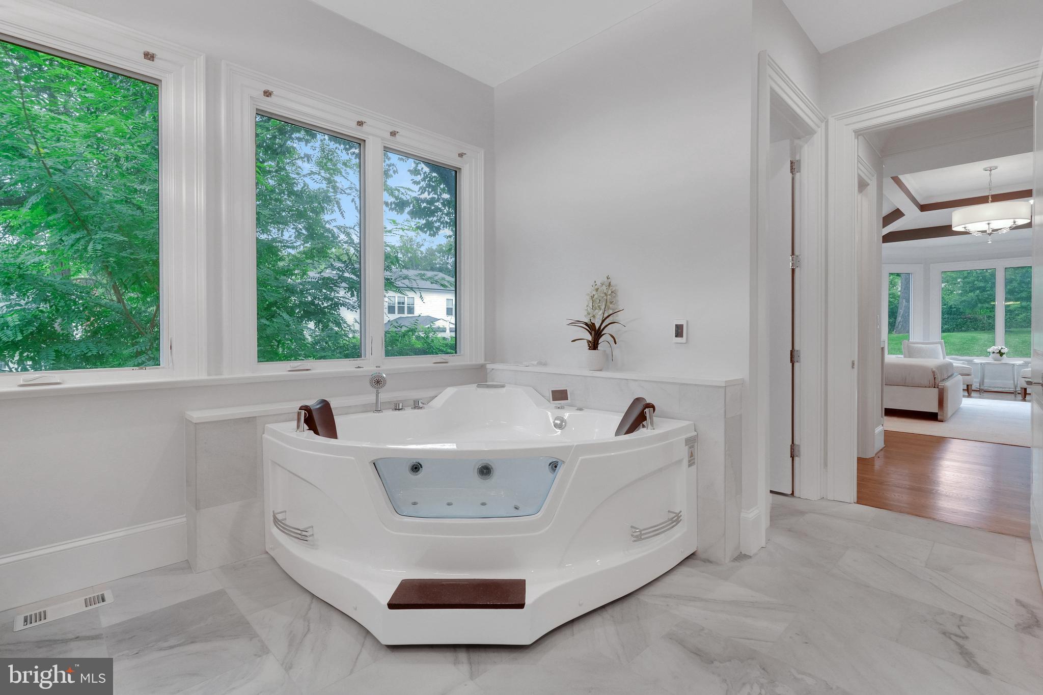 305 Old Courthouse Road Northeast Vienna, VA 22180 - Photo 27 of 69 a spacious bathroom with bathtub and window