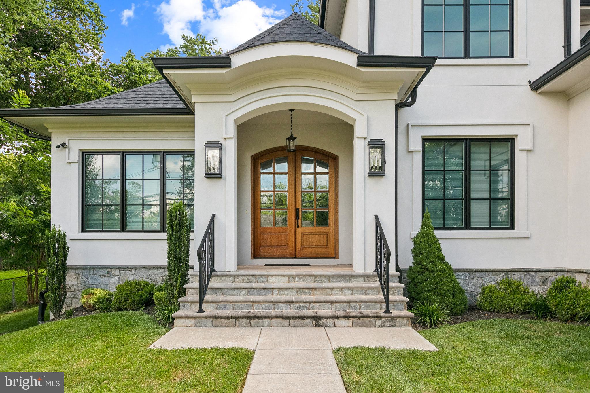 305 Old Courthouse Road Northeast Vienna, VA 22180 - Photo 3 of 69 a front view of a house with a yard