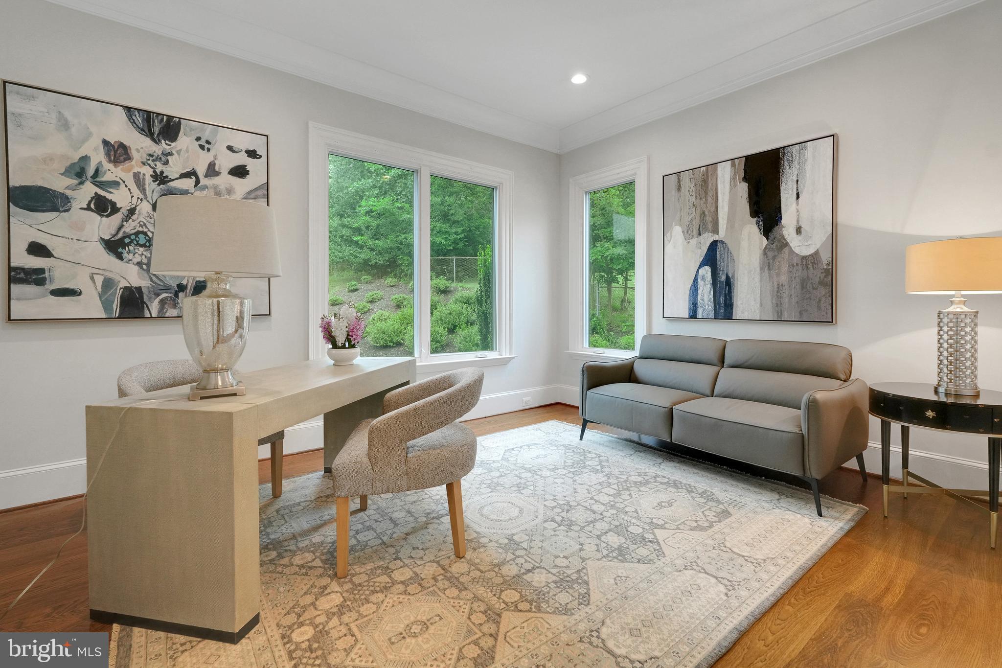 305 Old Courthouse Road Northeast Vienna, VA 22180 - Photo 32 of 69 a living room with furniture and a large window