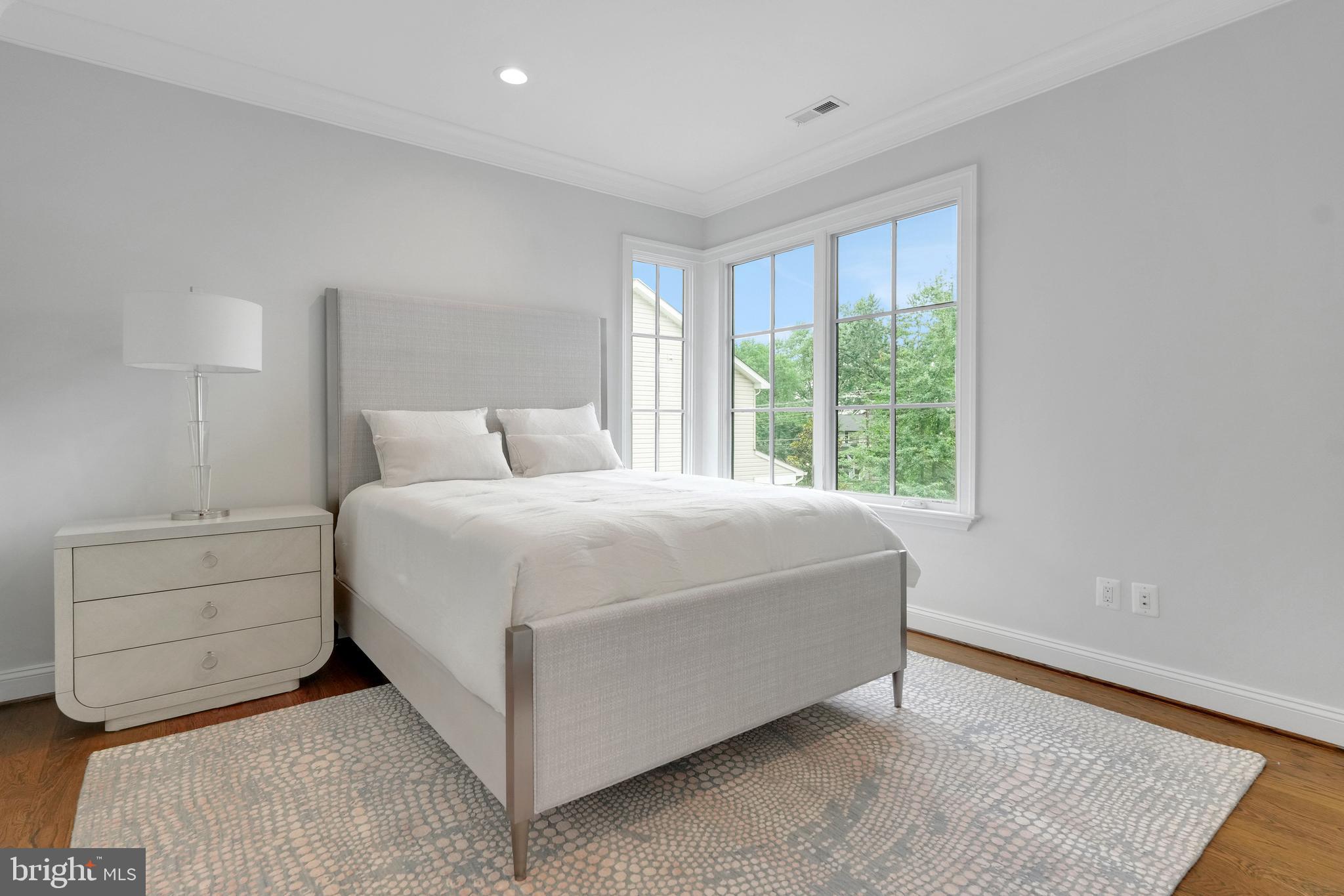 305 Old Courthouse Road Northeast Vienna, VA 22180 - Photo 44 of 69 a bedroom with a bed and window