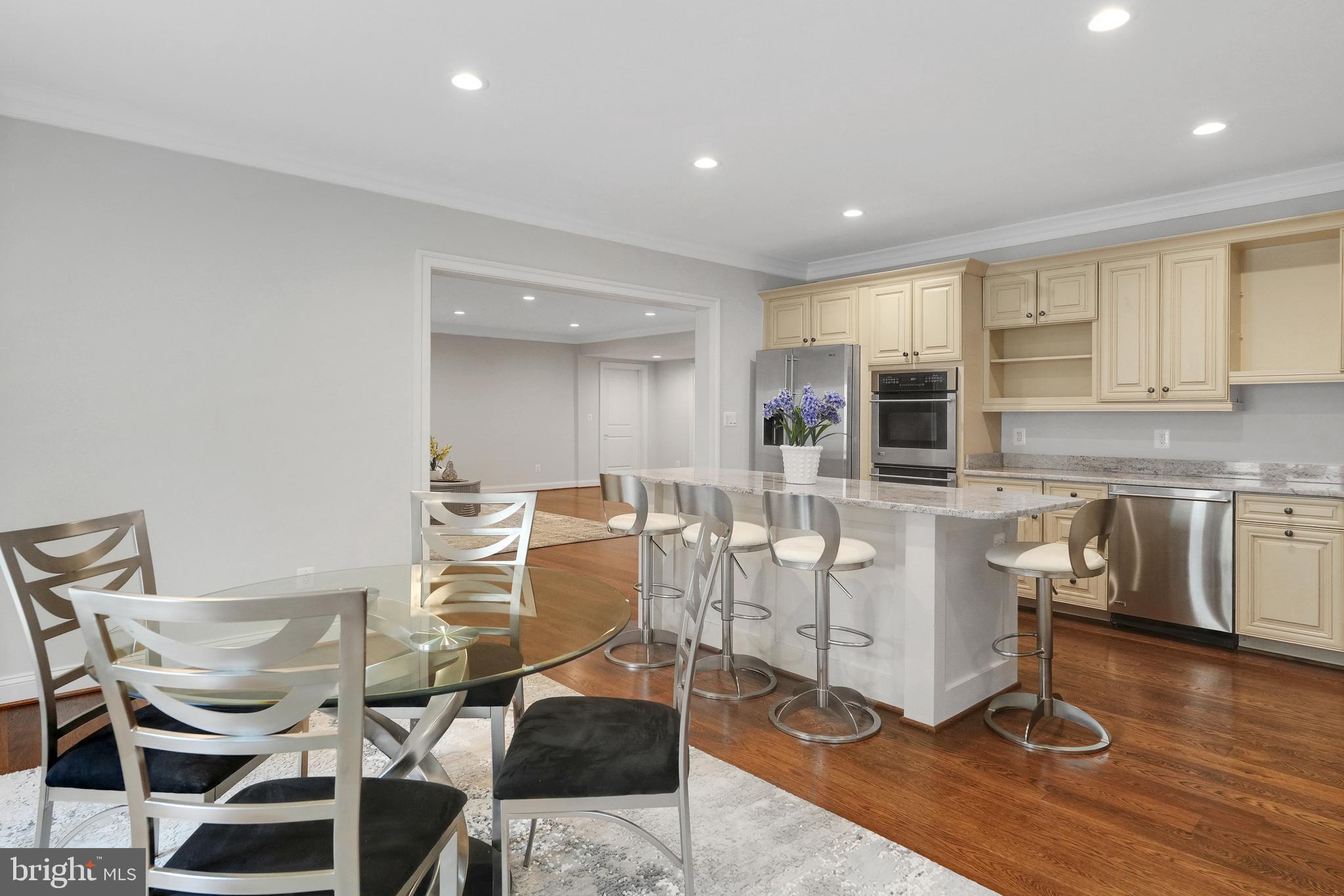 305 Old Courthouse Road Northeast Vienna, VA 22180 - Photo 51 of 69 a living room with dining room and kitchen view