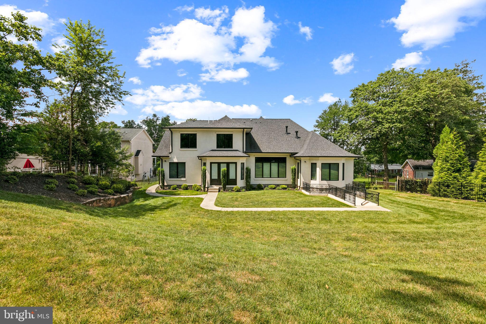 305 Old Courthouse Road Northeast Vienna, VA 22180 - Photo 60 of 69 a view of a house with swimming pool and a yard